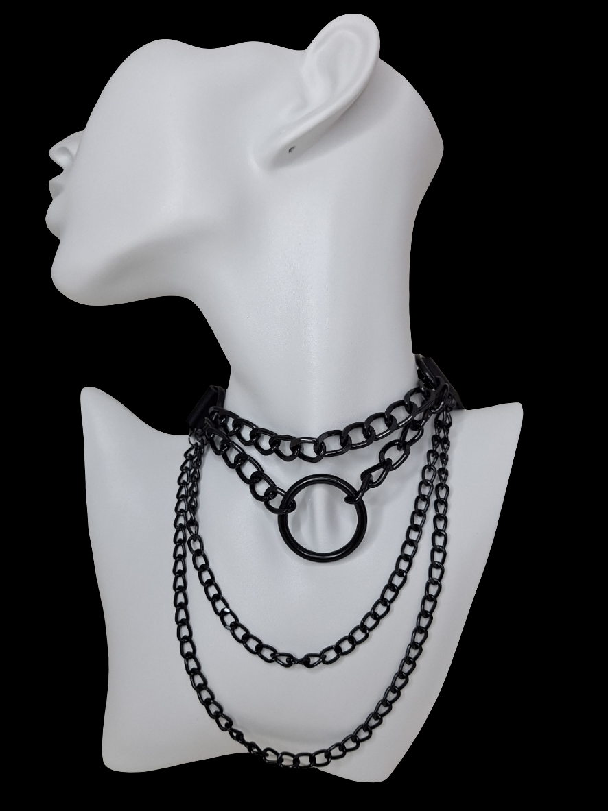 Measuring approximately 16" with 5 holes for adjustment. All parts of this Choker are black, giving it a more authentic look. The faux leather fabric looks good with a soft felt-type fabric on the back - where it touches the skin. 