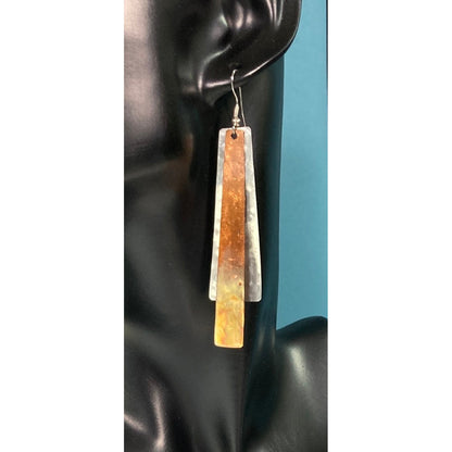 Chic Earrings - Close up. Aluminum and Copper metal earrings are definitely chic looking. Measuring 2 3/4" not including the Sterling silver ear wire. Every pair will be different in it's color variations, based on the torching process and could include; yellow, gray, blue and reddish brown.