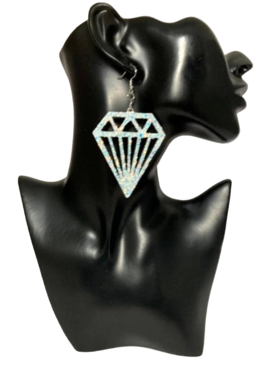 These are diamond shaped earrings, using iridescent paper. An unmistakable design from CBU. Measurements: 2 x 2 1/4", not including the Sterling silver ear wire. A fab find at $26.00 "Diamonds on Diamonds" - that really sparkle!