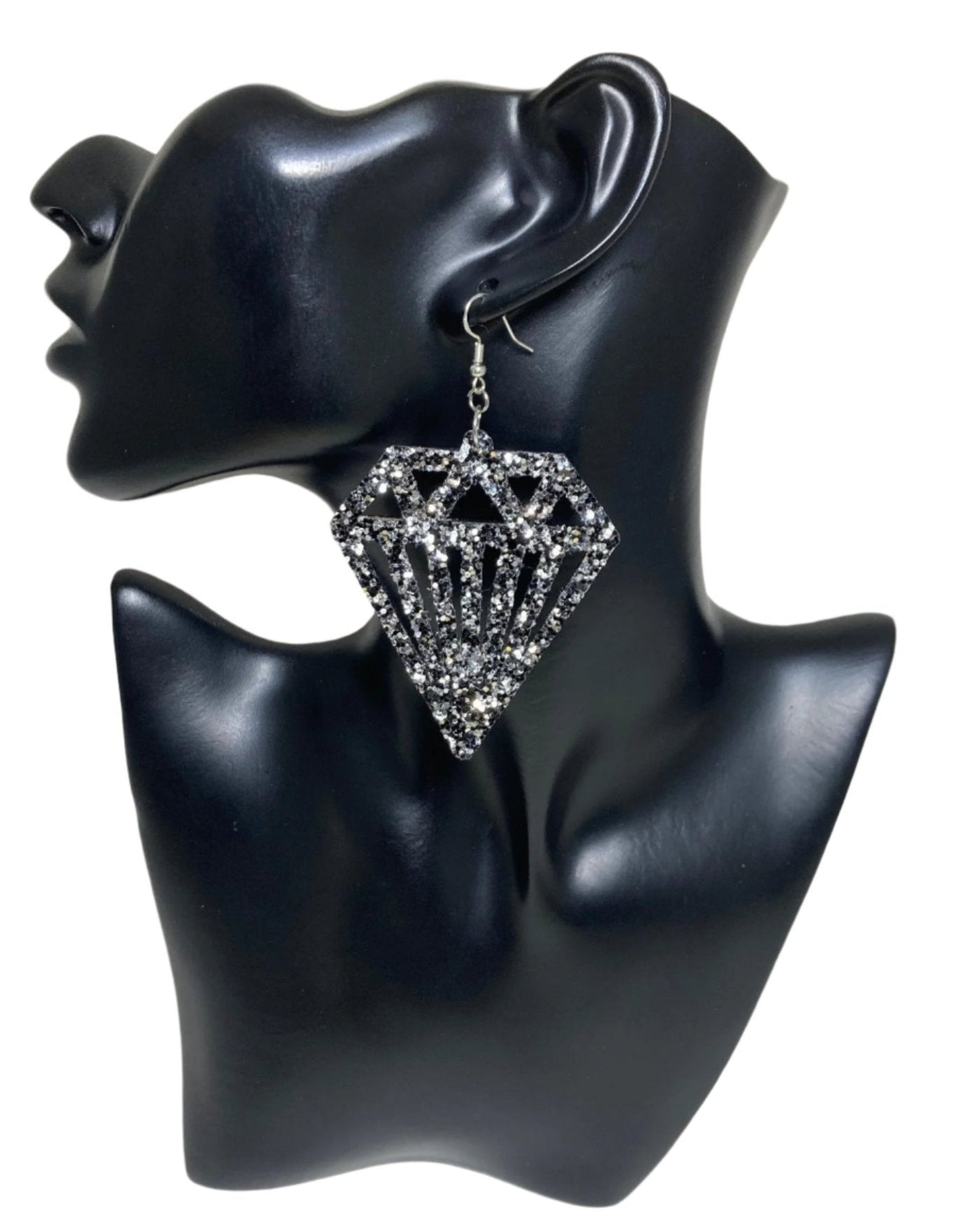 Large Diamond Sparkling Earrings, featuring a Black and Silver diamond cut-out and an unmistakable statement design from CBU. Flaunt your daring style and daring spirit!&nbsp;  Measurements: 2 x 2 1/4", not including the Sterling silver ear wire. A fab find at $26.00 Diamonds on Diamonds, that really sparkle!