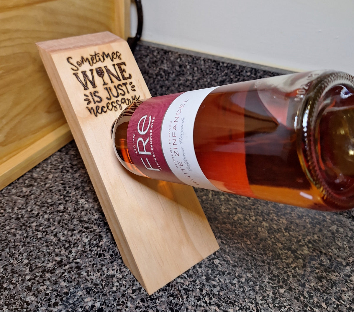 This compact wooden board (9x5") seems to defy gravity.
Available in Golden Pecan (GP) stain finish.
Currently avail. with 3 quirky phrases burned into the board. This board has the phrase: 2 - Sometimes Wine Is Just Necessary 