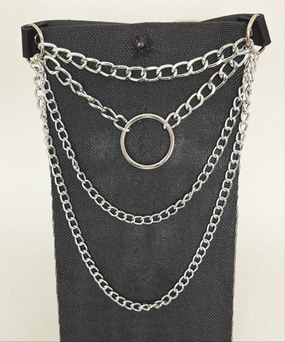 Shown in Black faux leather with 3 levels of chains and a 1 1/4" centered sphere. It hangs at a comfortable length of 6 1/2" from its lowest point. It includes 3 strategically placed rivets (2 and1) on either side with a 1" wide buckle to make it easier to fasten. 5 notches completes the Choker so you can choose the best length for your outfit. 