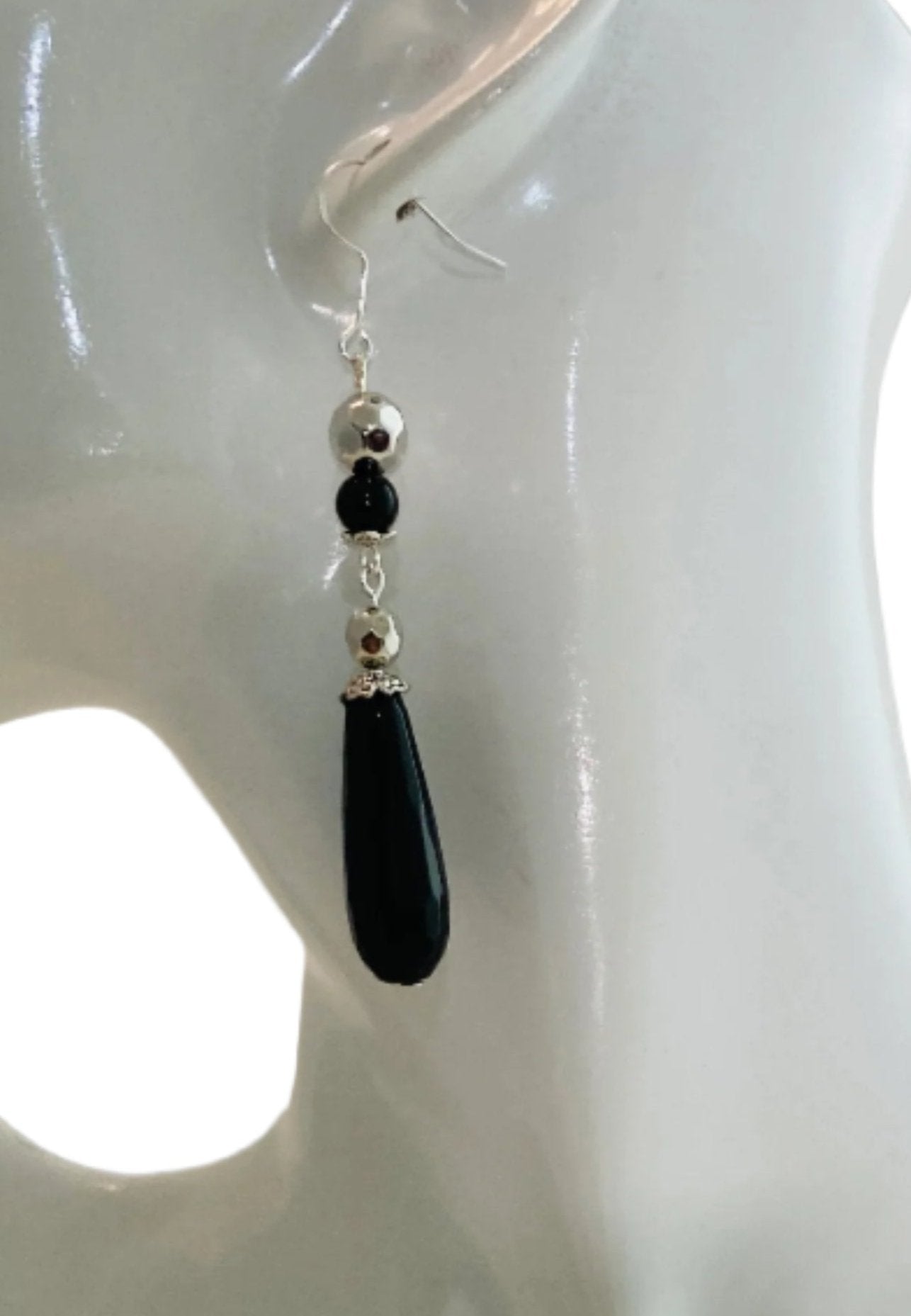 These earrings measure 2" in length (Sterling silver ear wire not included)
Each pair features a corresponding color bead and 2 silver beads for added charm.