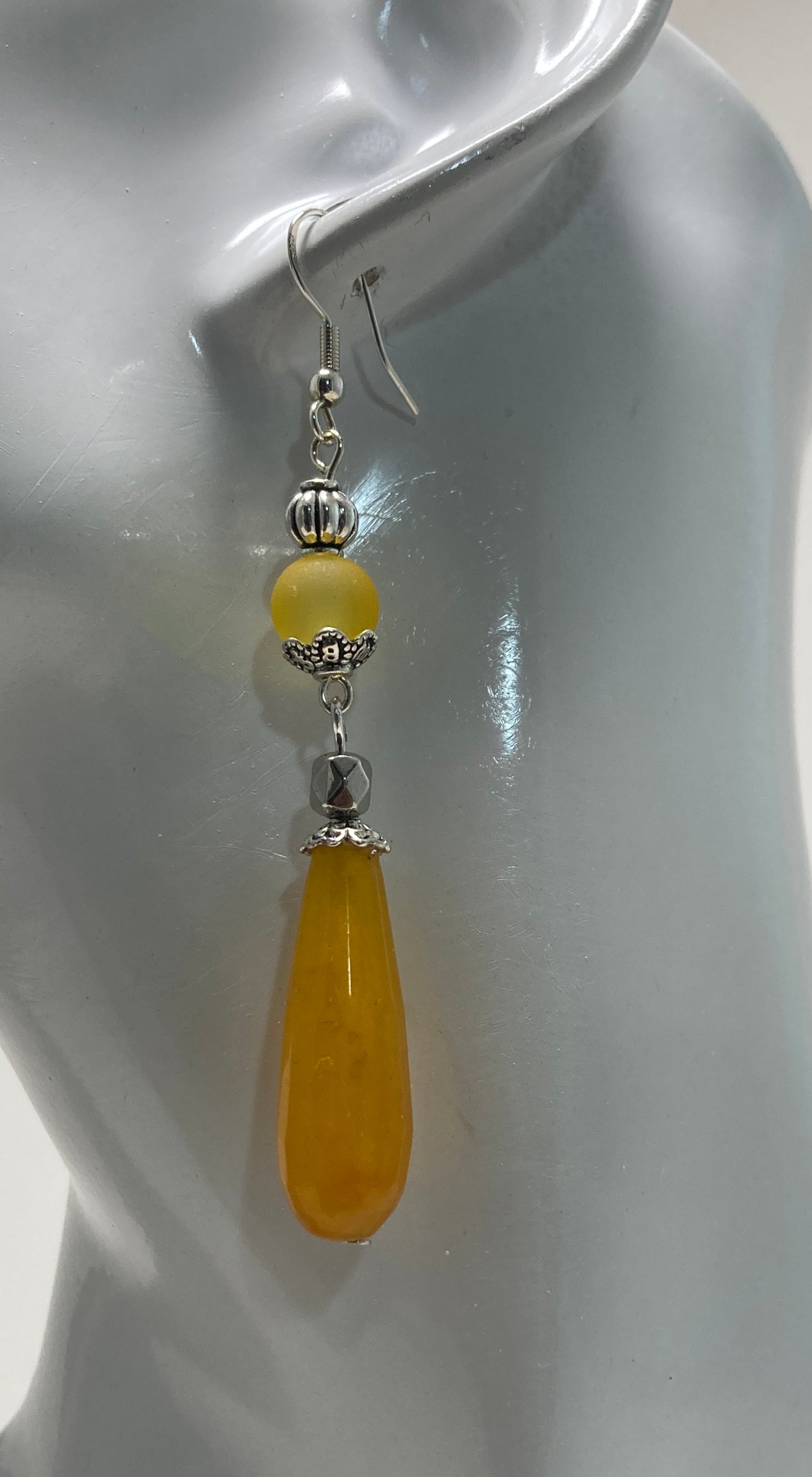 These earrings measure 2" in length (Sterling silver ear wire not included)
Each pair features a corresponding color bead and 2 silver beads for added charm.