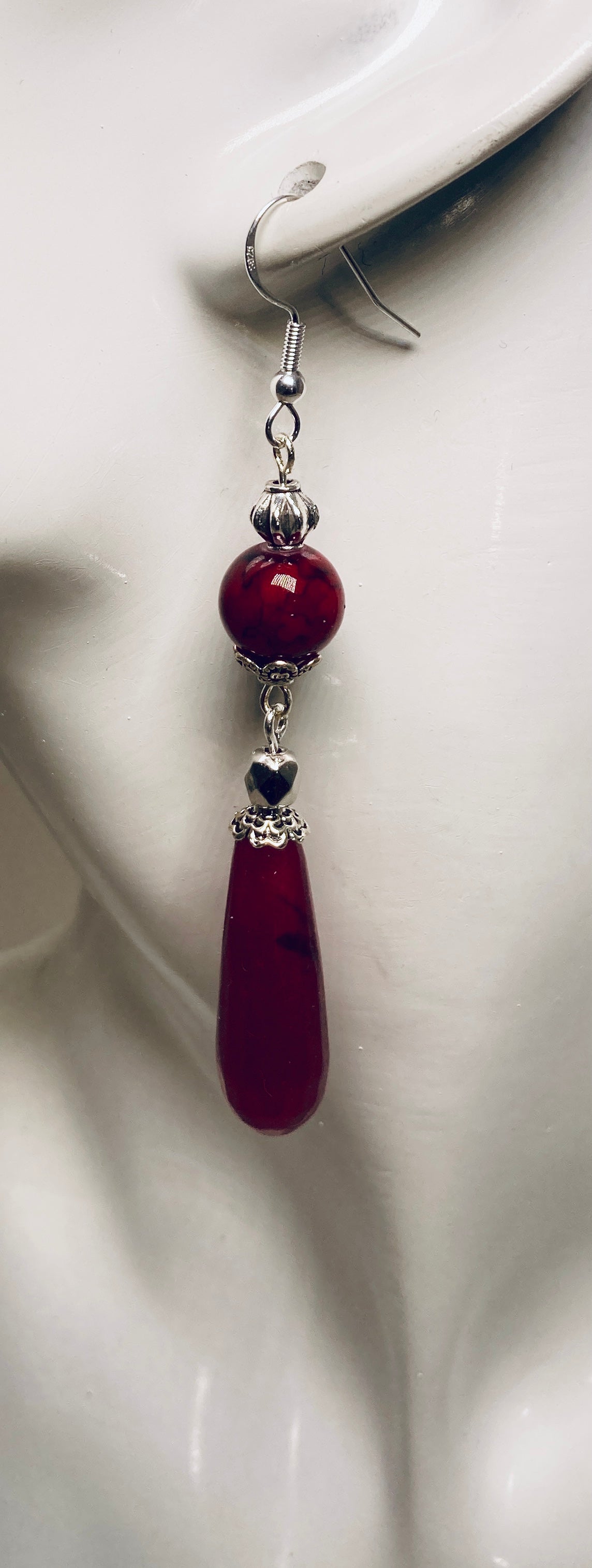 These earrings measure 2" in length (Sterling silver ear wire not included)
Each pair features a corresponding color bead and 2 silver beads for added charm.