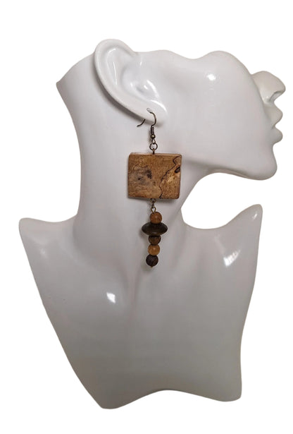 Spalted Birchwood 1 1/8" top bead followed by 1 modern &amp; 4 rustic beads.
Measurements: 2 3/4" (not including the brass hypoallergenic ear wires)
Just try and beat this style at the price listed for a limited time.&nbsp;