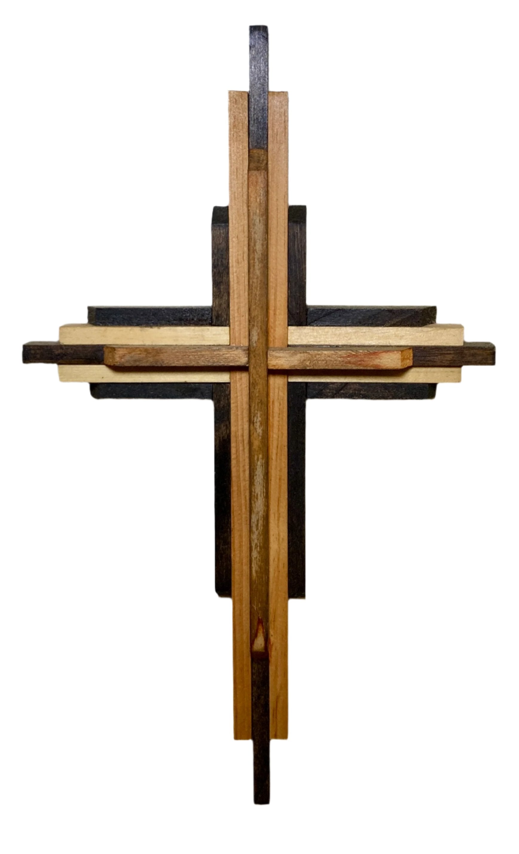 A series of several maple wood stain finishes combined together creates this authentic yet modern design.&nbsp;
Small pictured here:
A final Polyurethane protective coat completes the cross to extend it's&nbsp; inspirational look.
Comes with a Heavy duty screw for hanging.&nbsp;
Available in two sizes for the perfect space.&nbsp;
Small (S) - 16 1/2 x 9 1/2" and Large (L) - 32 x 21".&nbsp;