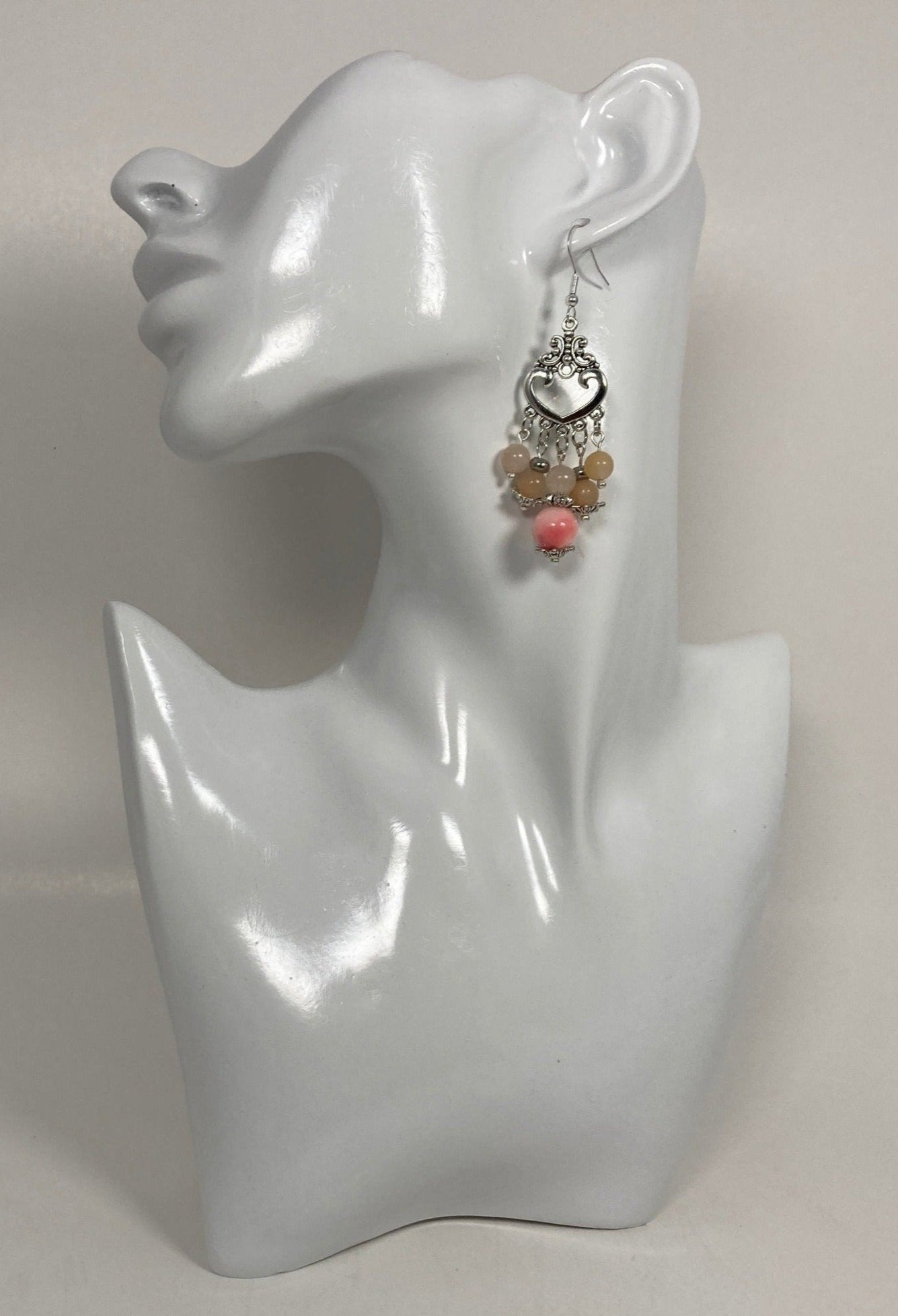 Chandelier Sphere shaped Earrings: Tibetan Silver,  Pink colored beautiful cracked glass beads, a Bohemian & Classic look. Approximately 3"s including hypoallergenic hooks. 