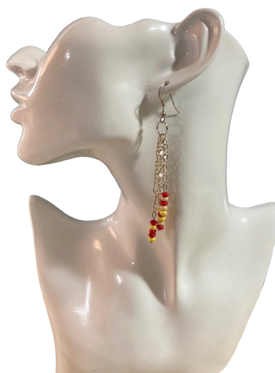 Classic & feminine, 3 chains small beads for a total of on 3.5". Finished with Sterling silver ears wires. Shown in Red, Cream and yellow. Additional colors coming soon.