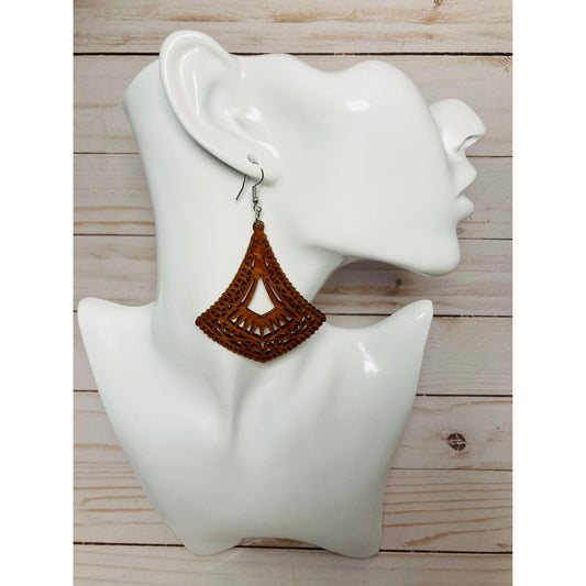 Style #3 is curved at bottom. Similar to Style #4 with it's intricate designs that sweep up to a point at top. Also, a very classy looking pair that really needs no introduction. Approx. 2.5" wide and 3" long. Care needs to be taken while wearing this pair as the wooden cutouts. Finished with a Sterling silver ear wire.